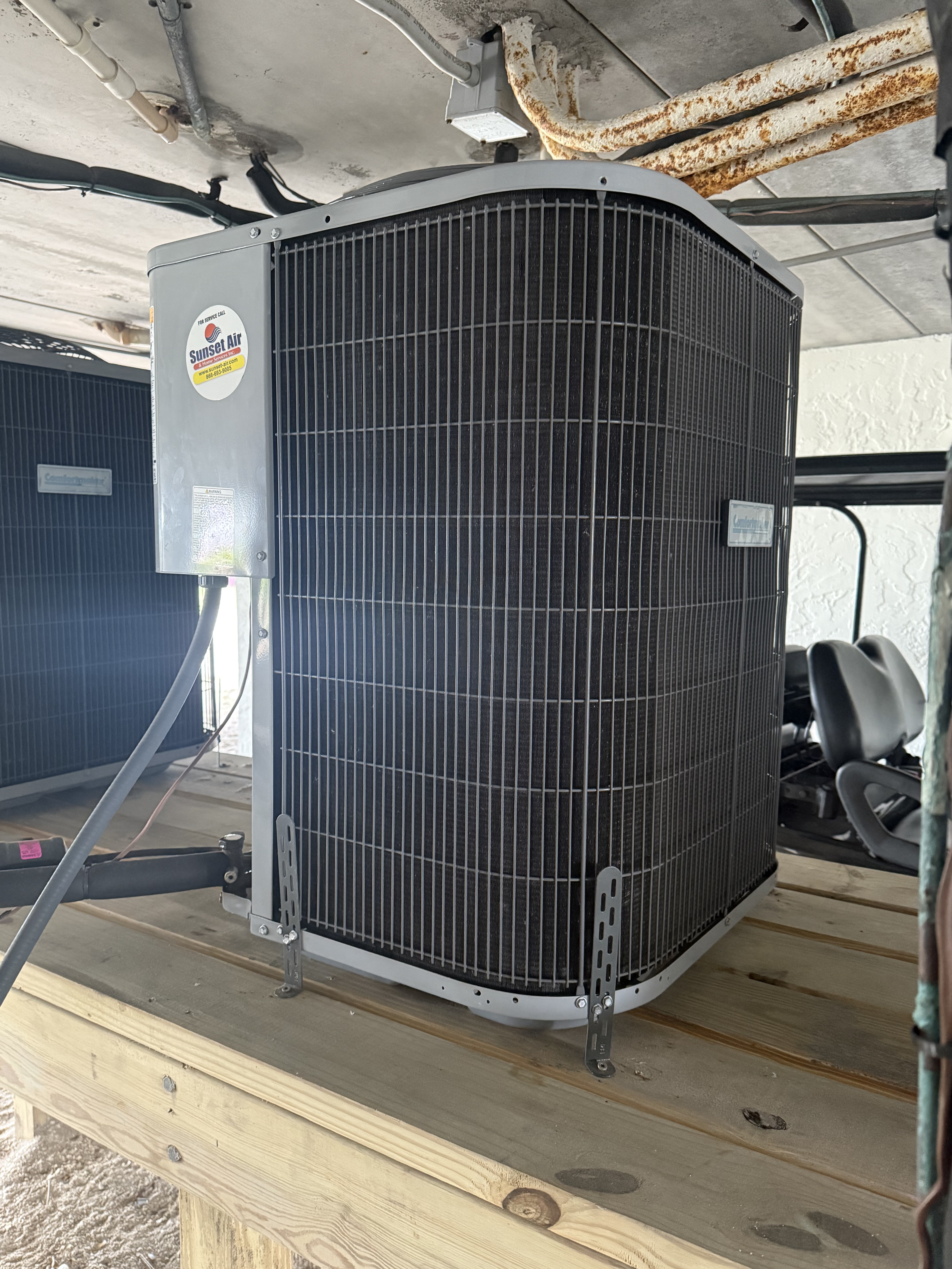 Condenser unit under building on the beach